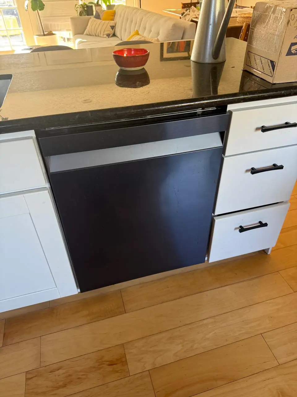 Panel-front dishwasher installed in a kitchen island — repaired by Marian Appliance Repair